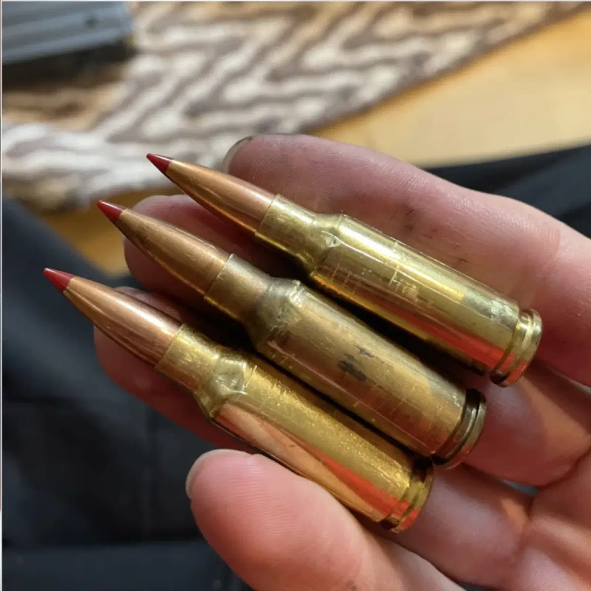 brass is dented and gouged after being fed
