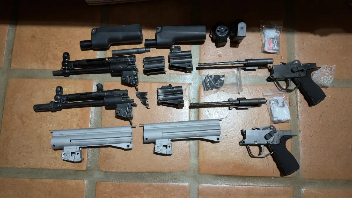HK MP5s. Not much left of the receivers, but the front stub is good.