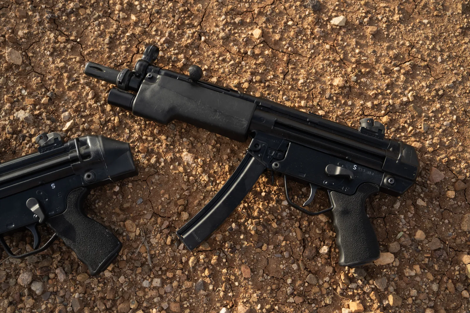 Two HK MP5s rewelded from their original receiver stubs